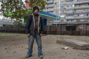 A drug addict boy is portrayed near Gara de Nord in Bucharest, Romania on November 6, 2011. During the winter hundreds of persons, sleep in the basement of the city to find heat. 