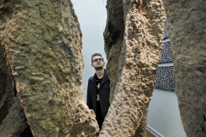 A man admires an installation during the opening of an art exhibition at the gallery “Salon Akademii” in Warsaw on February 18, 2014.