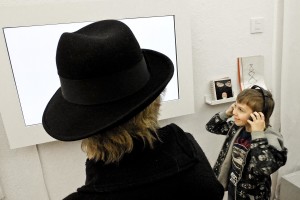 A woman and a child admire an ‘installation during the opening of an art exhibition at the gallery “Salon Akademii” in warsaw on February 18, 2014. 