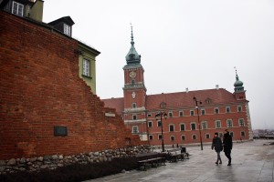 People walking near Plac Zamkowy in the historic center of Warsaw on February 13, 2014.