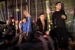 Young people drink and have fun all inside of one of the many disco clubs in Warsaw on February 16, 2014.