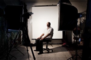 Ezzeddine (47 years) inside of a photo studio posing for his photo-card in Tunis on October 12, 2012.