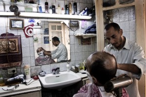 A man in a salon shaving in the heart of the old city in Tunis on October 21, 2012.