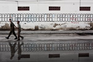 Two soldiers walking near the gate of Bab El Khadhra in Tunis on October 16, 2012.