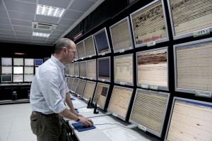 A technician inside the monitoring room of INGV (National Institute Geophysics and Volcanology) Osservatorio Vesuviano department which constantly monitors volcanic activity of mount Vesuvius, Campi Flegrei, Ischia island and Stromboli island in Naples, Italy on March 19, 2014.  