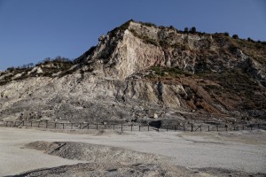 A general view of Solfatara volcano from which emerge fumaroles in Pozzuoli, Italy on September 2, 2013. Fumaroles are volcanic steam releases that contain sulfur causing a malodour similar to addle eggs.  