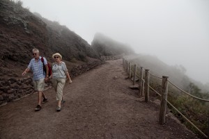 Tourists on the pedestrian path of Vesuvius cone in Naples, Italy on September 9, 2013.