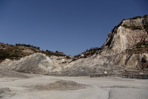 A general view of Solfatara volcano from which emerge fumaroles in Pozzuoli, Italy on September 2, 2013. Fumaroles are volcanic steam releases that contain sulfur causing a malodour similar to addle eggs.  