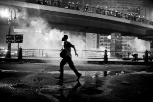 July 15, 2013 – Cairo, Egypt: A supporter of the Muslim Brotherhood and of Egypt’s ousted President Mohamed Morsi during a demonstration under the Six October Bridge in the center of Cairo. The demonstrators demanding the reinstatement of Morsi clashed with riot police as they tried to block the bridge, one of the main highways in the capital.