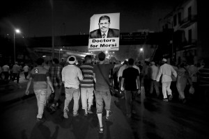 July 16, 2013 – Cairo, Egypt: Supporters of the Muslim Brotherhood and of Egypt’s ousted President Mohamed Morsi during a demonstration under the Six October Bridge in the center of Cairo. The demonstrators demanding the reinstatement of Morsi clashed with riot police as they tried to block the bridge, one of the main highways in the capital.