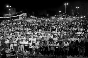 July 15, 2013 – Cairo, Egypt: Anti-Morsi demonstrators pray at Tahrir Square.