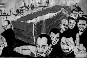 July 14, 2013 – Cairo, Egypt: A mural shows the funeral of a person killed during the Egyptian revolution of 2011. 