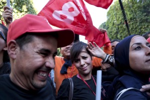 Supporters of Tunisian presidential candidate and leader of the Free Patriotic Union (UPL) party, Slim Riahi, attend a campaign rally in Avenue Bourguiba in Tunis on November 21, 2014. The Free Patriotic Union came third in last month’s parliamentary election with 16 seats. 