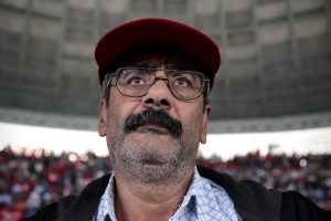 A supporter of the leader of Popular Front, spokesman of the Tunisian Workers’ Party and presidential candidate Hamma Hammami during a meeting held at Sports palace in the Olympic city of El Menzah in Tunis on November 16, 2014.