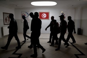 People walking inside the sports palace in the Olympic city of El Menzah before a campaign meeting of  Beji Caid Essebsi, Tunisian leader of the main anti-Islamist party Nidaa Tounes and presidential candidate in Tunis on November 15, 2014. 