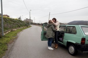 Marina Rinaldi greets a friend in Rufoli, south Italy, on February 24, 2015. Marina Rinaldi is the first ex trans in the world to coach a soccer team.