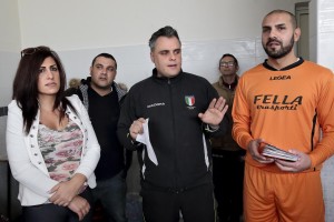 Marina Rinaldi in the locker room during the recognition of players made by referee before the championship match against Pro Casolla in Nocera Inferiore, south Italy, on March 1, 2015. Marina Rinaldi is the first ex trans in the world to coach a soccer team.
