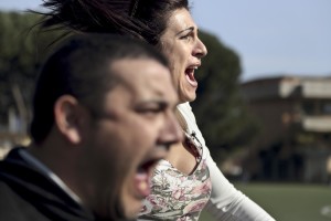 Marina Rinaldi and the second coach Antonio Ragone exult after a goal during the match against Pro Casolla in Nocera Inferiore, south Italy, on March 1, 2015. Marina Rinaldi is the first ex trans in the world to coach a soccer team.