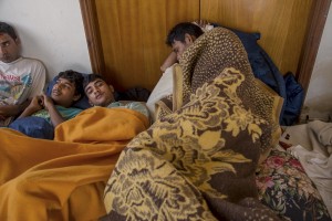 Afghans migrants rests in an abandoned hotel where many migrants sleep in Kos island, Greece on June 8, 2015. Many migrants are continuing to arrive on the Greek Island of Kos from Turkey. The Island has recently seen a drop in tourist numbers which has been attributed to negative reports on the migrant crisis that is continuing to grip the area. Around 30,000 migrants have entered Greece so far in 2015, with the country calling for more help from its European Union counterparts.