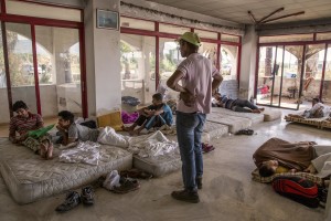 Pakistani migrants are seen in an abandoned hotel where many migrants sleep in Kos island, Greece on June 15, 2015. Many migrants are continuing to arrive on the Greek Island of Kos from Turkey. The Island has recently seen a drop in tourist numbers which has been attributed to negative reports on the migrant crisis that is continuing to grip the area. Around 30,000 migrants have entered Greece so far in 2015, with the country calling for more help from its European Union counterparts.