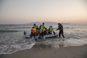 A group of Pakistani migrants arrive on the beach in a dinghy at dawn after making their way from Turkey in Kos island, Greece on June 14, 2015. Many migrants are continuing to arrive on the Greek Island of Kos from Turkey. The Island has recently seen a drop in tourist numbers which has been attributed to negative reports on the migrant crisis that is continuing to grip the area. Around 30,000 migrants have entered Greece so far in 2015, with the country calling for more help from its European Union counterparts.