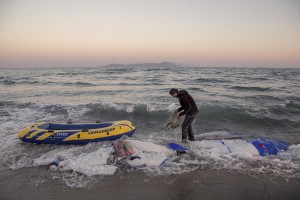A Pakistani migrant arrives on the beach in a dinghy at dawn after making his way from Turkey to Kos island, Greece on June 15, 2015. Many migrants are continuing to arrive on the Greek Island of Kos from Turkey. The Island has recently seen a drop in tourist numbers which has been attributed to negative reports on the migrant crisis that is continuing to grip the area. Around 30,000 migrants have entered Greece so far in 2015, with the country calling for more help from its European Union counterparts.