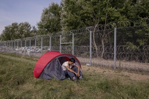 A migrant near the border that divides Serbia and Hungary in Horgos, Serbia on September 16, 2015. Hungary’s border with Serbia has become a major crossing point into the European Union for migrants, with more than 160,000 accessing Hungary so far this year.