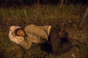 A migrant sleeps on the street near the Serbian border with Hungary in Horgos, Serbia on September 15, 2015. Hungary’s border with Serbia has become a major crossing point into the European Union for migrants, with more than 160,000 accessing Hungary so far this year.