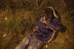 A migrant sleeps on the street near the Serbian border with Hungary in Horgos, Serbia on September 15, 2015. Hungary’s border with Serbia has become a major crossing point into the European Union for migrants, with more than 160,000 accessing Hungary so far this year.