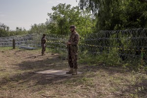 Military are seen near the Hungarian border with Serbia, in Rozske, Hungary on September 15, 2015. The right-wing nationalist government led by Viktor Orbán has closed the entire border with Serbia on September 15, 2015 after the entry into force of new rules that make it illegal and punishable by law. Hungary’s border with Serbia has become a major crossing point into the European Union, with more than 160,000 access Hungary so far this year.