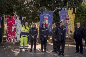 Policemen are seen during the funerals of 26 teenage migrant women found dead in the Mediterranean sea in early November, during the inter religious funeral service at the cemetery of Salerno, southern Italy on November 17, 2017. The bodies of the victims were found floating in the water by Cantabria Spanish ship last November 5.