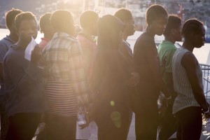 Migrants are seen after the arrival of the Norvegian border patrol ship Siem Pilot at Salerno harbour on October 5, 2016. Migrants on the ship were mostly from Nigeria, Gambia, Eritrea, Pakistan and Guinea.