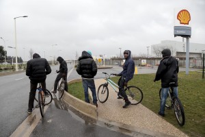 January 27, 2016 – Calais, France: A group of migrants is seen outside the camp of Calais, known as “The Jungle”, where thousands of migrants live. While migrants have for years sought to cross over to Britain from Calais, the numbers have shot up since the refugee crisis went into overdrive last year.