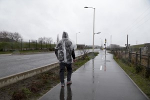 January 27, 2016 – Calais, France: A migrant walks outside the camp of Calais, known as “The Jungle” where thousands of migrants live. While migrants have for years sought to cross over to Britain from Calais, the numbers have shot up since the refugee crisis went into overdrive last year.