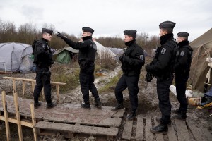January 30, 2016 – Grande-Synthe, France: Gendarmes performing a check inside the refugee camp of Grande-Synthe near Dunkirk, northern France, known as “The Jungle 2″. Around 3,000 refugees and migrants of Kurdish descent from Iraq and Syria live in the camp.