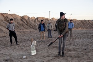 January 28, 2016 – Calais, France: Migrants play cricket outside the refugee camp of Calais, known as “The Jungle”. While migrants have for years sought to cross over to Britain from Calais, the numbers have shot up since the refugee crisis went into overdrive last year.