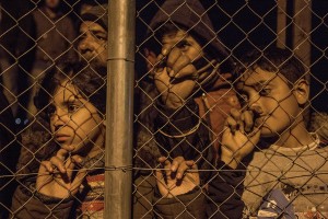 Children during a migrants night rally demanding the reopening of the border with Macedonia, in the hopes of making their way to northern Europe in Idomeni, Greece on March 21, 2016.