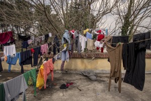 Clothes hanging to dry inside the makeshift camp of Idomeni at the Greek Macedonian border where thousands of migrants and refugees are stranded in Idomeni, Greece on March 17, 2016.