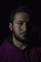 Sino, 20 years old Yazidi from Iraq is portrayed in the makeshift camp at the Greek-Macedonian borders near the village of Idomeni in Greece, on March 19, 2016.
