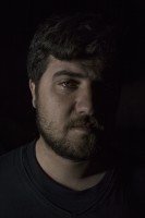 Samir, 25 years old Yazidi from Iraq is portrayed in the makeshift camp at the Greek-Macedonian borders near the village of Idomeni in Greece, on March 19, 2016.