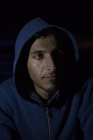 Samir, 29 years old from Baghdad, Iraq is portrayed in the makeshift camp at the Greek-Macedonian borders near the village of Idomeni in Greece, on March 18, 2016.