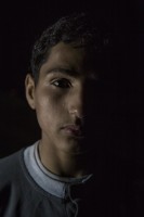 Mahmed, 16 years old from Aleppo, Syria is portrayed in the makeshift camp at the Greek-Macedonian borders near the village of Idomeni in Greece, on March 20, 2016.