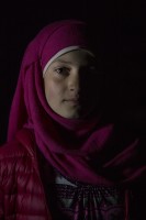 Rawan, 13 years old from Aleppo, Syria is portrayed in the makeshift camp at the Greek-Macedonian borders near the village of Idomeni, in Greece on March 18, 2016.