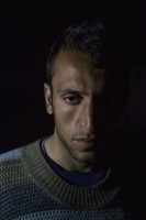 Hosuil, 22 years old Yazidi from Iraq is portrayed in the makeshift camp at the Greek-Macedonian borders near the village of Idomeni, in Greece on March 19, 2016.