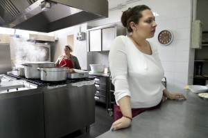 March 13, 2016 – Naples, Italy – Gypsy women at work inside the kitchen of Chikù restaurant in Scampia, Secondigliano district. Chikù is the first Italian-Romanian restaurant, where the Neapolitan and Balkans cuisine merge in a common size. Besides being a gastronomic space, the Chikù restaurant is a place of integration and pedagogical experimentation dedicated to children, families, young people, students, workers, and to anyone who wants to meet and communicate, have fun and socialize.