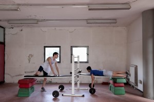 May 17, 2016 – Naples, Italy: Athletes during warm up before swimming workouts at the pool Massimo Galante in Scampia district. Massimo Galante swimming pool founded in 2013 has quickly become a reference point for young people who believe in the sport and is already getting major trophies, like the silver medal won by Giulio Iaccarino, 16 years old, at the Italian championships.