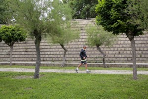 May 29, 2016 – Naples, Italy: A man runs inside the Scampia public garden in Secondigliano district.