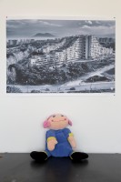 March 13, 2016 – Naples, Italy – A poster depicting the “Vele” palaces of Scampia and a puppet  are seen inside Chikù restaurant in Scampia, Secondigliano district.