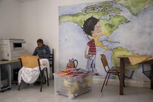 GRUMO NEVANO, ITALY – APRIL 23: A woman rests in a classroom of “CENTRO ASTALLI”, a CAS (Extraordinary Reception Center) in Campania, Southern Italy on April 23, 2017. CAS are imagined in order to compensate the lack of places inside ordinary reception center in case of substantial arrivals of migrants.