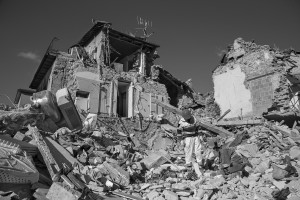 LAZIO, ITALY – AUGUST 24: Rescuers search for victims in the rubble after a strong earthquake hit Amatrice on August 24, 2016. Italy was struck by a powerful, 6.2-magnitude earthquake in the night, which has killed at least 297 people and devastated dozens of houses in the Lazio village of Amatrice.